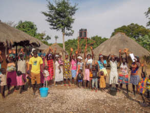 Etighaore with their new clean water tank and tap