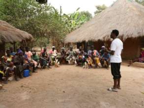 Joao at a community meeting