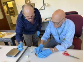 Carlos working with William, Penn Museum