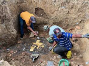 excavating bottom level of tomb T9