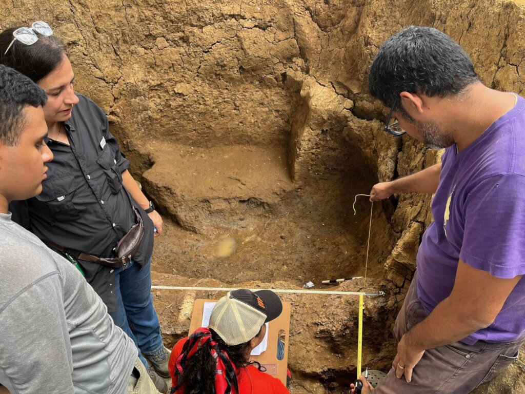 Students working on scale diagrams with Dr. Mayo