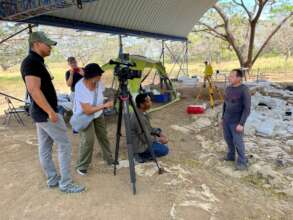 Dr. Hervas speaking with news media