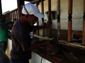 Banisters being sanded