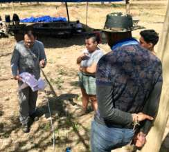 Dr. Hervas working with students on measurements