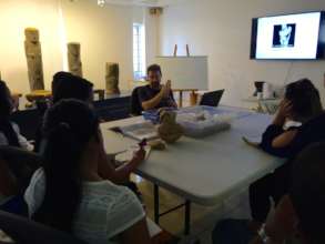 Dr. Jesus Herrerin teaching a class to students.