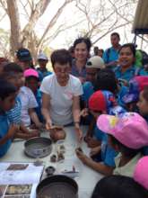 Drs. Julia Mayo, Mercedes Guinea with school kids