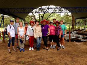 Red Hat Society members visit with Dr. Mayo