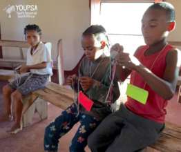 learning cardboard circle disk knitting
