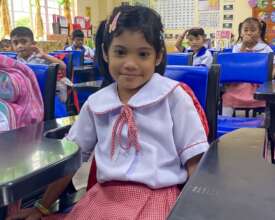 Anchel inside her classroom