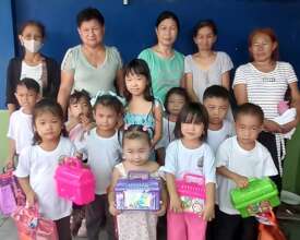 Tanza Daycare Students & Parents with new supplies