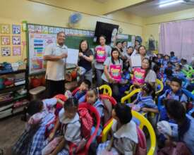 Lupang Pangako teachers receiving school materials