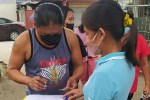 Parent volunteers help facilitate distribution
