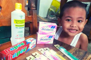 A Pitpitac daycare student with his hygiene kit