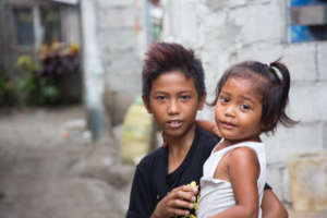 A Daycare Student with her brother