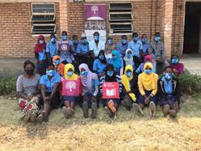 Students sport the masks provided by Abundance