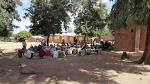 Community meeting at Mbando Village