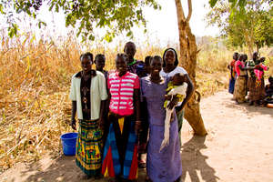 Women waiting for help to start beekeeping project