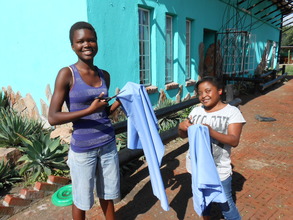 Charity and Lindiwe are ready for sewing class!