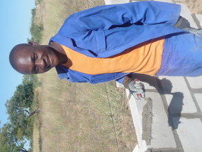 Foster, 18, laying block for the Resource Center