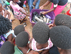 A bucket of shoes for outreach
