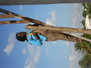 Sithibisiwe assembling solar panel infrastructure