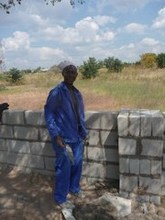Senior Collen Makurmuridze cementing first block