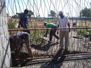 Seniors installing the gate