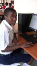 A top student in his class doing some research