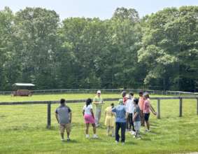 CBS group waiting to meet farm animals