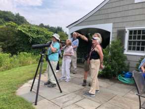 Seniors observing and learning about birds