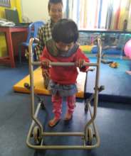 Radhika* learning to walk with a rollator