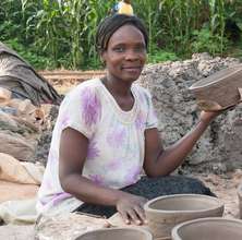 Returnee making clay stove to make a living