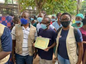 Our team with the outbreak's first survivor