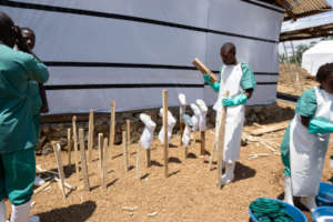 Sanitizing all the equipment, even the boots.