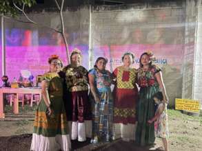 Women's group members in traditional dress