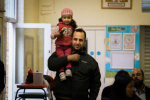 A father and his child at one of our celebrations
