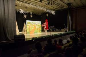Drama play and Santa giving presents 3
