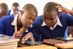 Teamwork - students help each other to navigate