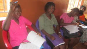 Girls receiving reproductive health training