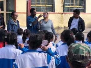 Students learn how to brush their teeth.