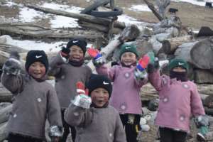Happy students with their new Tibetan jackets!