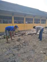 Labour worker getting ready to start construction