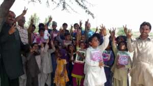 Very Happy Children Having Books with Teacher