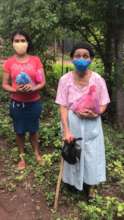 Patients with masks and hygiene kits