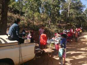 Villagers lined up for treatment