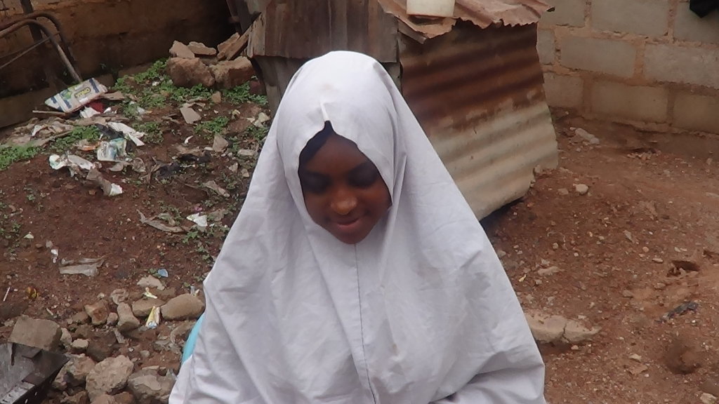 Aisha, a widow and mother