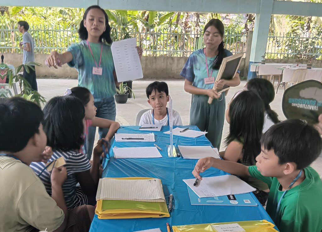 Mentoring village children during the summer break