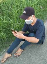 Downloading class materials in the rice field
