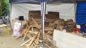 The salvaged timber from the pallets.