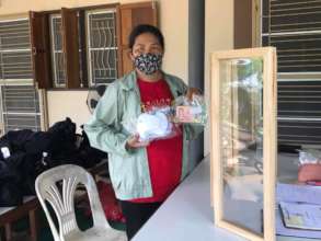 Delivering masks and payment for labour